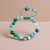 This handmade green agate wrist mala from Nepal features 108 hand-knotted beads, supporting mantra recitation and spiritual growth with its grounding and purifying energies.