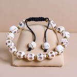 Howlite Stone Skull Wrist Mala, handmade in Nepal by skilled artisans, serves as a meaningful companion for meditation, promoting wisdom, transformation, and clarity on your spiritual journey.