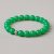 This handmade Jade Stone Wrist Mala, crafted in Nepal by skilled artisans, embodies love and prosperity, fostering benevolence and calm during meditation and spiritual practice.