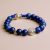 Handmade in Nepal by skilled artisans, this Lapis Lazuli wrist mala supports your meditation practice, fostering emotional balance and deepening your spiritual journey.