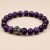 Handmade in Nepal by skilled artisans, this Mantra Amethyst Stone Wrist Mala enhances meditation, inviting peace and clarity while supporting your spiritual journey and well-being.