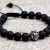 Handmade in Nepal by skilled artisans, this lava stone wrist mala connects you to the earth, enhancing emotional stability and inner strength during meditation and daily life.