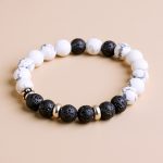 Real Howlite Stone Wrist Mala, handmade in Nepal by skilled artisans, supports spiritual growth and mindfulness, fostering inner calmness and emotional stability for the practitioner on their journey.
