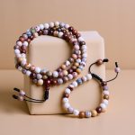 This handmade polychrome jasper prayer mala and bracelet set from Nepal supports your spiritual journey, enhancing connection to the earth and aiding in meditation and inner peace.