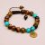 Handmade in Nepal by skilled artisans, this Tree of Life & Tiger Eye Stone Wrist Mala serves as a spiritual companion, promoting tranquility and vitality on your journey of mindfulness.