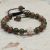 Unakite Stone Wrist Mala, handmade in Nepal by skilled artisans, promotes emotional healing and spiritual growth, guiding you towards balance and serenity on your journey of self-discovery.