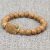 Handmade in Nepal, this Wood Jasper Stone Wrist Mala features golden colour white metal rings, nurturing emotional balance and stability for your spiritual practice.
