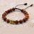 Handmade in Nepal by skilled artisans, this Bayong wood wrist mala features calming beads and a Buddha head guru bead, guiding you towards clarity and inner strength on your spiritual journey.