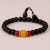 This handmade Rosewood wrist mala from Nepal, enriched with Coral Stone and resin amber, supports spiritual practice, fostering heart connection, courage, and tranquility on your journey.