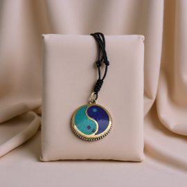 Yin and Yang Carved Pendant Necklace, handmade in Nepal by skilled artisans, symbolizes harmony and inner peace, enhancing your spiritual journey while complementing your attire.