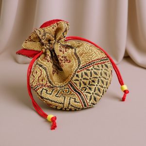 Handmade in Nepal by skilled artisans, this Silk and Cotton Mala Bag embodies purity and compassion, safeguarding your malas while honoring their spiritual significance on your journey.