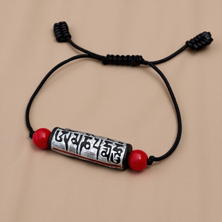 Coral Wrist Mala with Buddha Eye Mantra