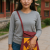 This handmade cotton crossbody bag, crafted in Nepal by skilled artisans, blends tradition and practicality, offering comfort and secure storage for your spiritual journey.