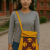 This traditional Tibetan crossbody bag is handmade in Nepal by skilled artisans, blending cultural heritage with practicality for your daily journeys and mindful adventures.