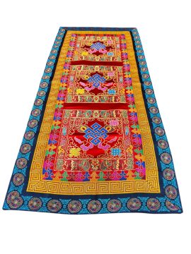Enhance your sacred space with this handmade Tibetan silk brocade table runner, crafted by skilled artisans in Nepal, featuring the endless knot symbol of interconnectedness.
