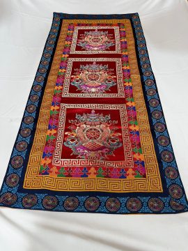 Enhance your shrine with this handmade Tibetan silk brocade table runner from Nepal, featuring auspicious symbols and a serene Wheel of Life, enriching your meditation space.