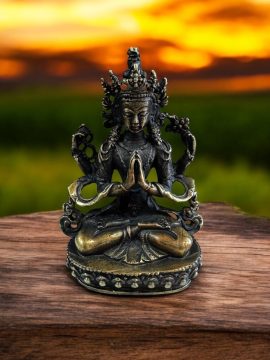 This handmade Chenrezig statue, created by skilled artisans in Nepal, embodies Avalokiteshvara's compassion, serving as a heartfelt reminder of unconditional love and mercy.