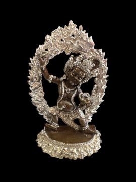 This handmade copper statue of Vajrapani Chana Dorje, crafted in Nepal, symbolizes strength and protection on the journey to enlightenment. A testament to traditional artisanship.