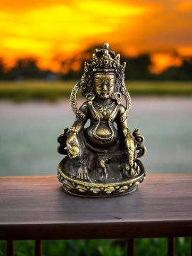 This handmade Zambala statue from Nepal symbolizes spiritual abundance and protection, inviting positive energy and reflecting the rich traditions of Vajrayana Buddhism.