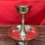 The Serkyem, a sacred ritual object, is handmade in Nepal by skilled artisans, symbolizing the offering of both liquid and solid sustenance to the deities during ceremonies.