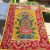 This handmade Tibetan Auspicious Symbol Placemat, crafted in Nepal, serves as a sacred space for meditation, embodying blessings through the eight auspicious symbols.