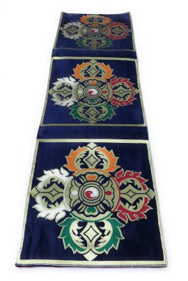 This handmade blue double dorje placemat, crafted by skilled artisans in Nepal, embodies the essence of enlightenment, enhancing your spiritual practice and enriching your meditation space.