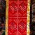 This handmade silk brocade Tibetan table cover, crafted by skilled artisans in Nepal, features the Endless Knot, symbolizing life's interconnectedness and enhancing your spiritual practice.