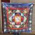 This handmade altar cloth from Nepal, adorned with a vibrant lotus design, enhances your shrine, inviting purity and spiritual awakening into your sacred space.