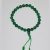 This handmade jade wrist mala, crafted in Nepal by skilled artisans, features 25 beads and a guru bead, guiding your spiritual journey with each mindful prayer.
