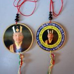 This handmade Karmapa car and door hanging, crafted by skilled artisans in Nepal, embodies compassion and guidance, inviting positive energy and protection into your life.