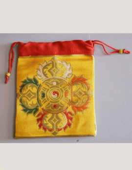 This handmade silk brocade dorje mala bag, crafted by skilled artisans in Nepal, protects your mala while reflecting your spiritual journey as a meaningful accessory.