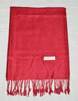 This handmade Tibetan meditation shawl, crafted in Nepal from a blend of pashmina and silk, envelops the practitioner in warmth, fostering focus and tranquility during meditation.