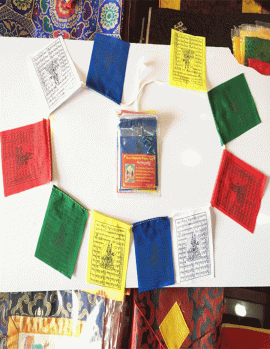 This handmade Tibetan Guru Rinpoche Cotton Prayer Flag, crafted by skilled artisans in Nepal, carries blessings and intentions, inviting peace and compassion into the world.