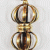 This handmade Dorje pendant, crafted by skilled artisans in Nepal, symbolizes the indestructible nature of truth and compassion within Tibetan Buddhism, embodying the male principle of method.