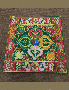 This handmade Tibetan Green dorje silk brocade shrine placemat, crafted by skilled artisans in Nepal, creates a sacred space for your meditation and prayer practices.