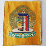 This handmade kalachakra silk brocade table mat, crafted by skilled artisans in Nepal, offers a sacred space for your spiritual practices and enhances your meditation environment.