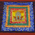This handmade altar cloth, crafted in Nepal by skilled artisans, reflects the spiritual essence of Tibetan Buddhism, enriching your meditation space with tranquility and devotion.