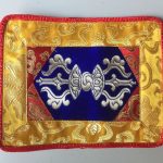 This handmade Blue Dorji Placemat, created by skilled artisans in Nepal, provides a sacred space for your dorje and bell, enriching your meditation and rituals.
